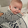 Jack joined the competition — help win amazing prizes! baby, infant, striped_clothing, face, blue_eyes, person, indoor, couch, cushion, resting, closeup, cute, child, portrait, smile, soft_lighting, casual_wear, human, head, baby_girl_or_boy