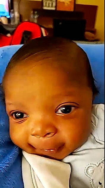 Kenny is registered to the contest to win money with this photo: baby, cheek, child, chin, close_up, ear, eye, eyebrow, face, facial_expression, forehead, head, human, jaw, joy, lip, mouth, nose, person, skin