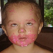 Joshua joined the competition — help win amazing prizes! background, birthday, cake, child, close_up, eyes, face, face_paint, frosting, greenery, hair, head, indoor, messy, photograph, pink, portrait, shoulders, skin, window