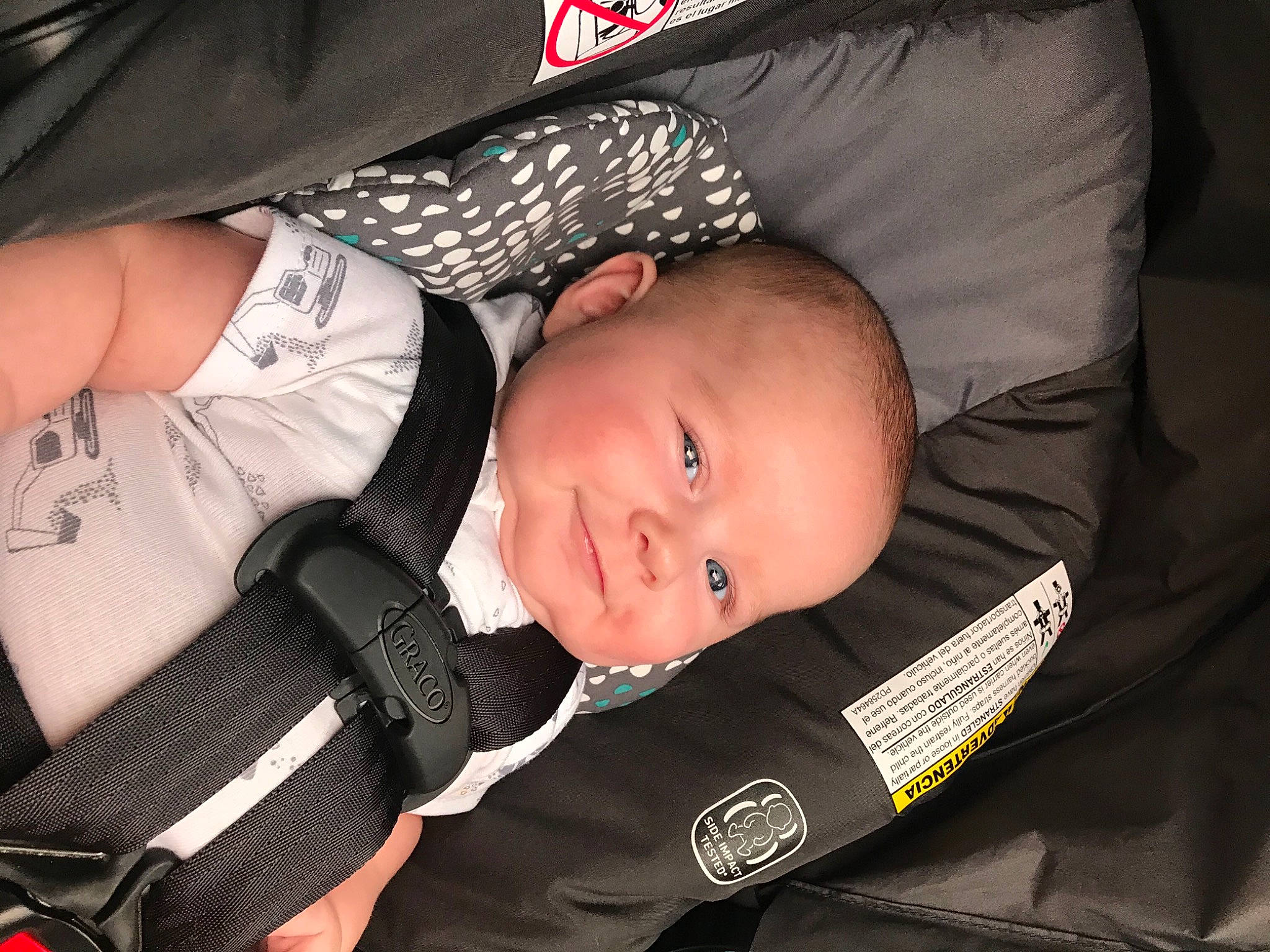 Cason is registered to the contest to win money with this photo: baby, baby_carriage, baby_products, baby_safety, baby_toddler_clothing, car_seat, carmine, child, comfort, elbow, fashion_accessory, finger, fun, joy, nail, pattern, person, product, sitting, skin