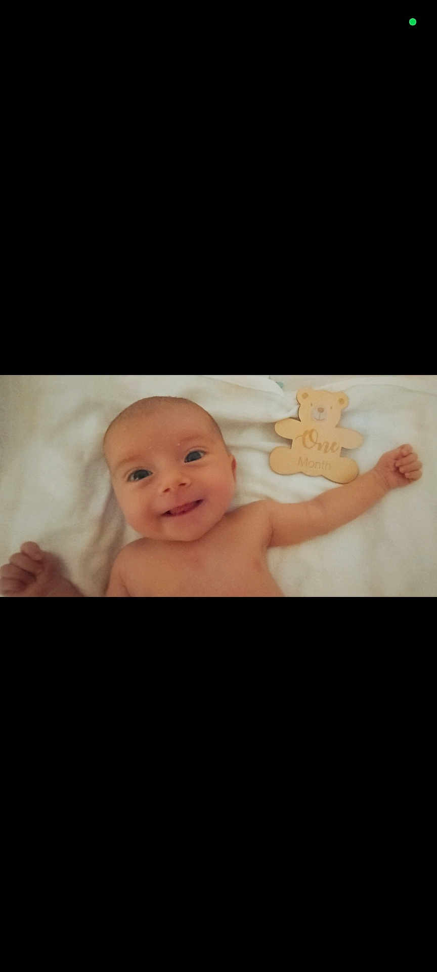 Azzurra participe au concours pour gagner de l'argent avec cette photo : baby, infant, smile, face, wooden_sign, teddy_bear, blanket, newborn, one_month, child, cute, happy, lying_down, skin, arms, portrait, young, person, indoor, sleeping_area