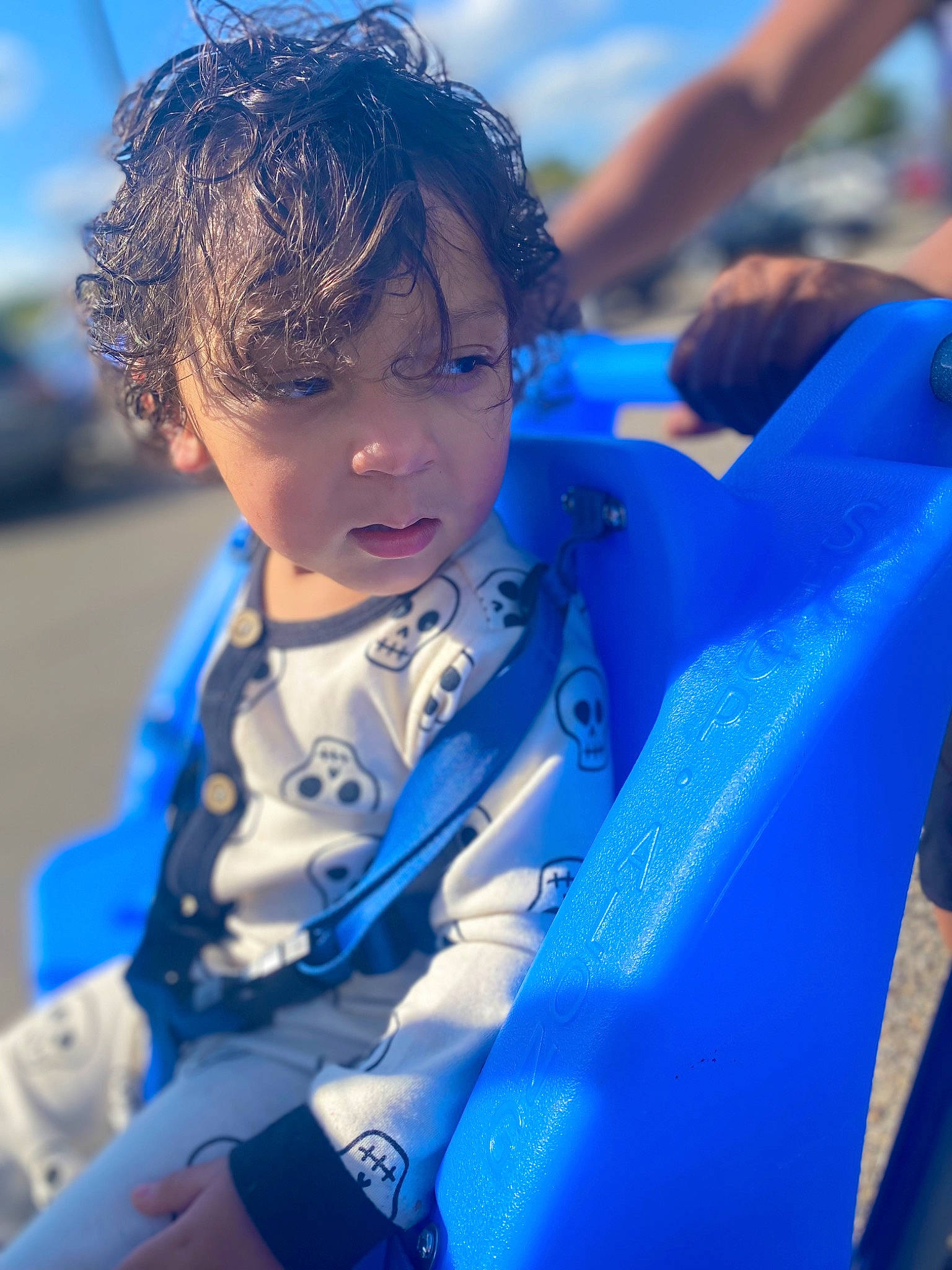 Azai is registered to the contest to win money with this photo: azure, baby, blue, child, electric_blue, event, fun, grass, happy, leisure, person, personal_protective_equipment, recreation, sitting, sky, toddler, tradition, winter