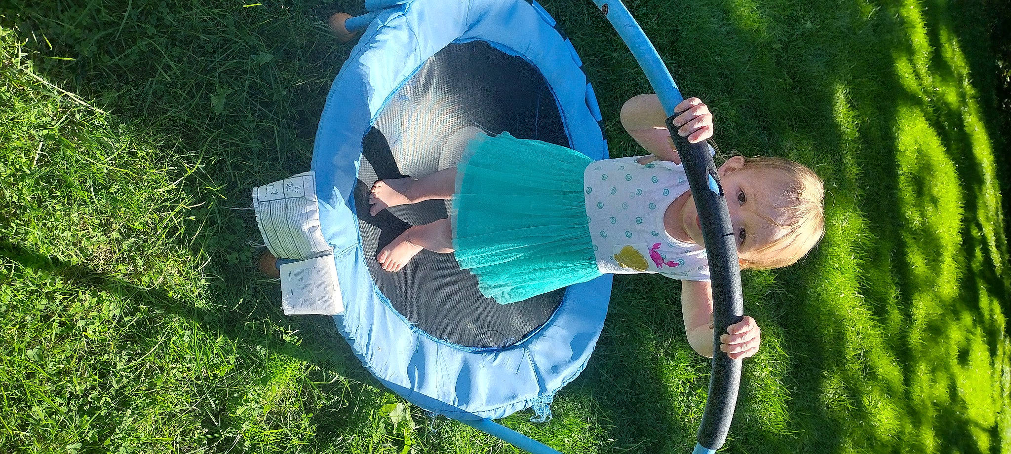 Lillyanna joined the competition — help win amazing prizes! chair, electric_blue, fashion_accessory, fun, grass, hat, lawn, leisure, people_in_nature, person, plant, pole, recreation, shade, shorts, tree, vacation