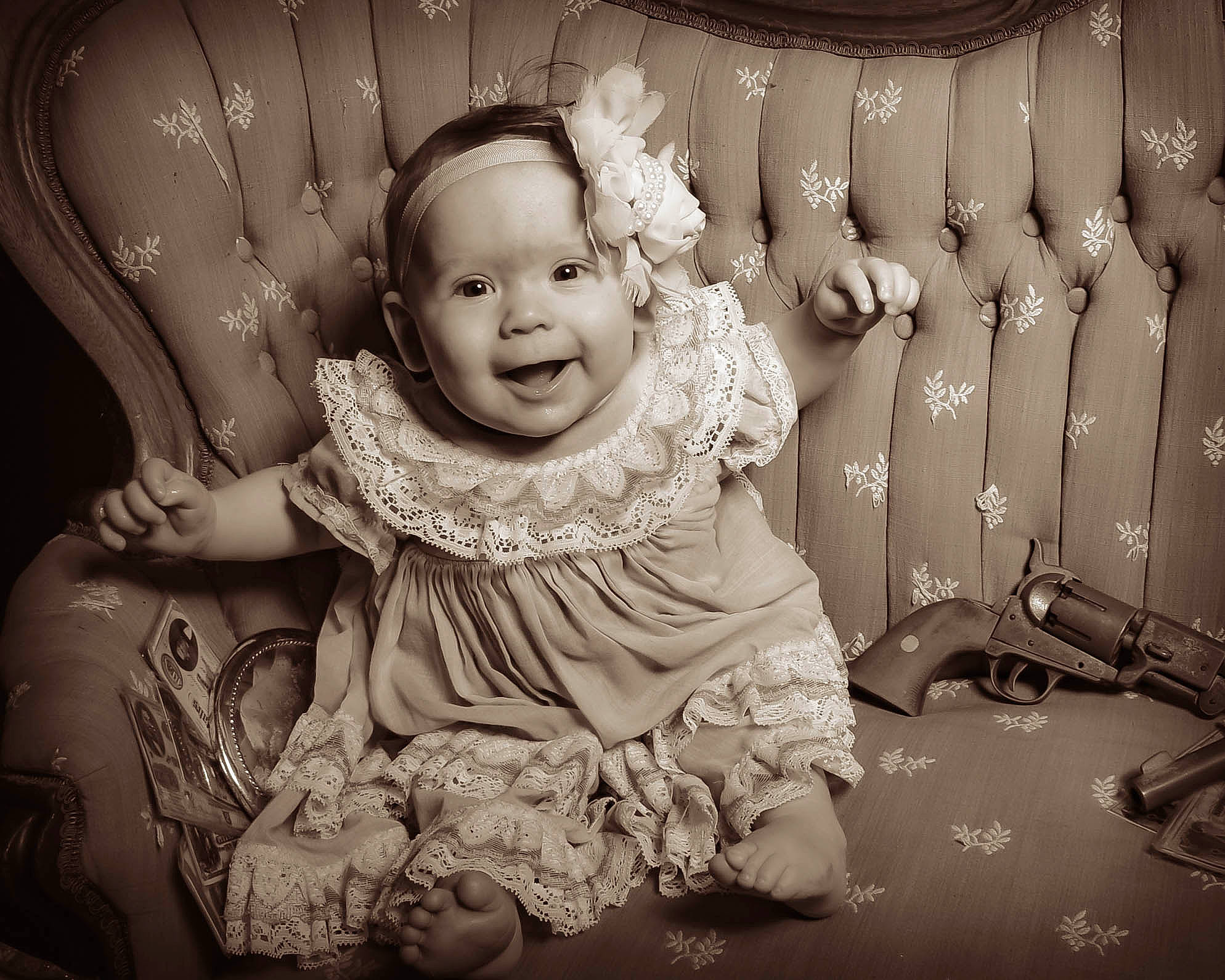 Maggie is registered to the contest to win money with this photo: baby, baby_toddler_clothing, black_and_white, cheek, child, dress, event, flash_photography, fun, happy, headpiece, iris, jewellery, laugh, monochrome, monochrome_photography, person, smile, stock_photography, style