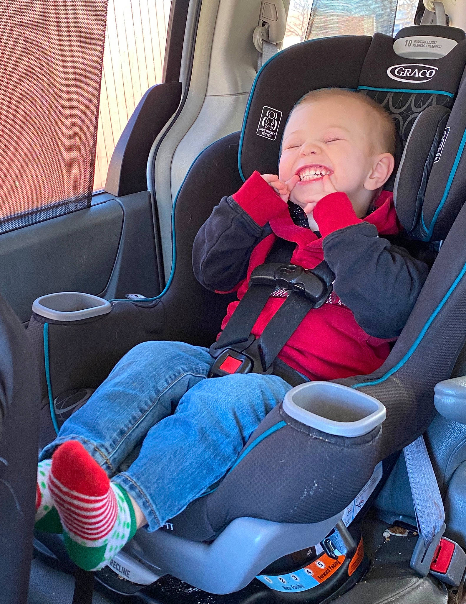 Micah is registered to the contest to win money with this photo: auto_part, baby_carriage, baby_in_car_seat, baby_products, car, car_seat, car_seat_cover, child, city_car, comfort, family_car, person, plant, product, toddler, vehicle