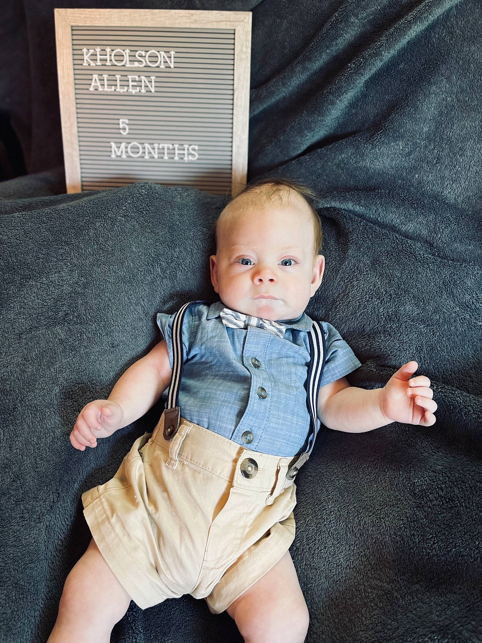 Kholson is registered to the contest to win money with this photo: baby, baby_toddler_clothing, cheek, child, collar, comfort, denim, electric_blue, flash_photography, hairstyle, human_leg, iris, leg, pattern, person, sitting, skin, sleeve, textile, thigh