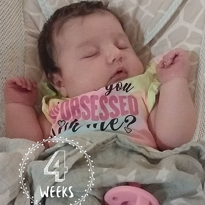 Ella is registered to the contest to win money with this photo: arm, baby, baby_sleeping, baby_toddler_clothing, cheek, child, comfort, eyebrow, eyelash, finger, hair, hand, happy, linens, lip, mouth, person, pink, product, skin