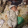 Kingston joined the competition — help win amazing prizes! baby, infant, pacifier, onesie, blanket, bedspread, floral_pattern, sleeping, clothing, foot, hand, baby_clothes, fabric, pattern, soft, cute, indoor, resting, child, newborn