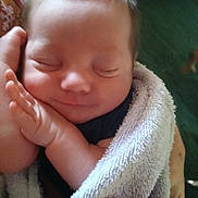 Kingston joined the competition — help win amazing prizes! baby, sleeping, towel, hand, infant, closeup, soft, skin, peaceful, wrapped, newborn, comfort, face, arm, fingers, person, rest, cute, gentle, indoors