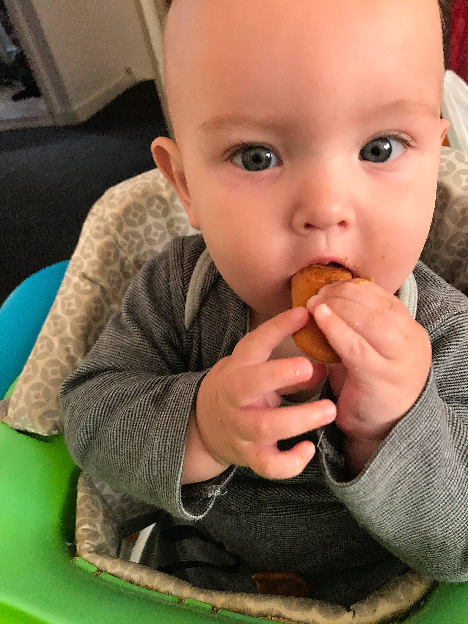 Loki is registered to the contest to win money with this photo: baby, biting, child, comfort_food, eating, finger, food, mouth, nose, person, sitting, surprise, thumb, toddler