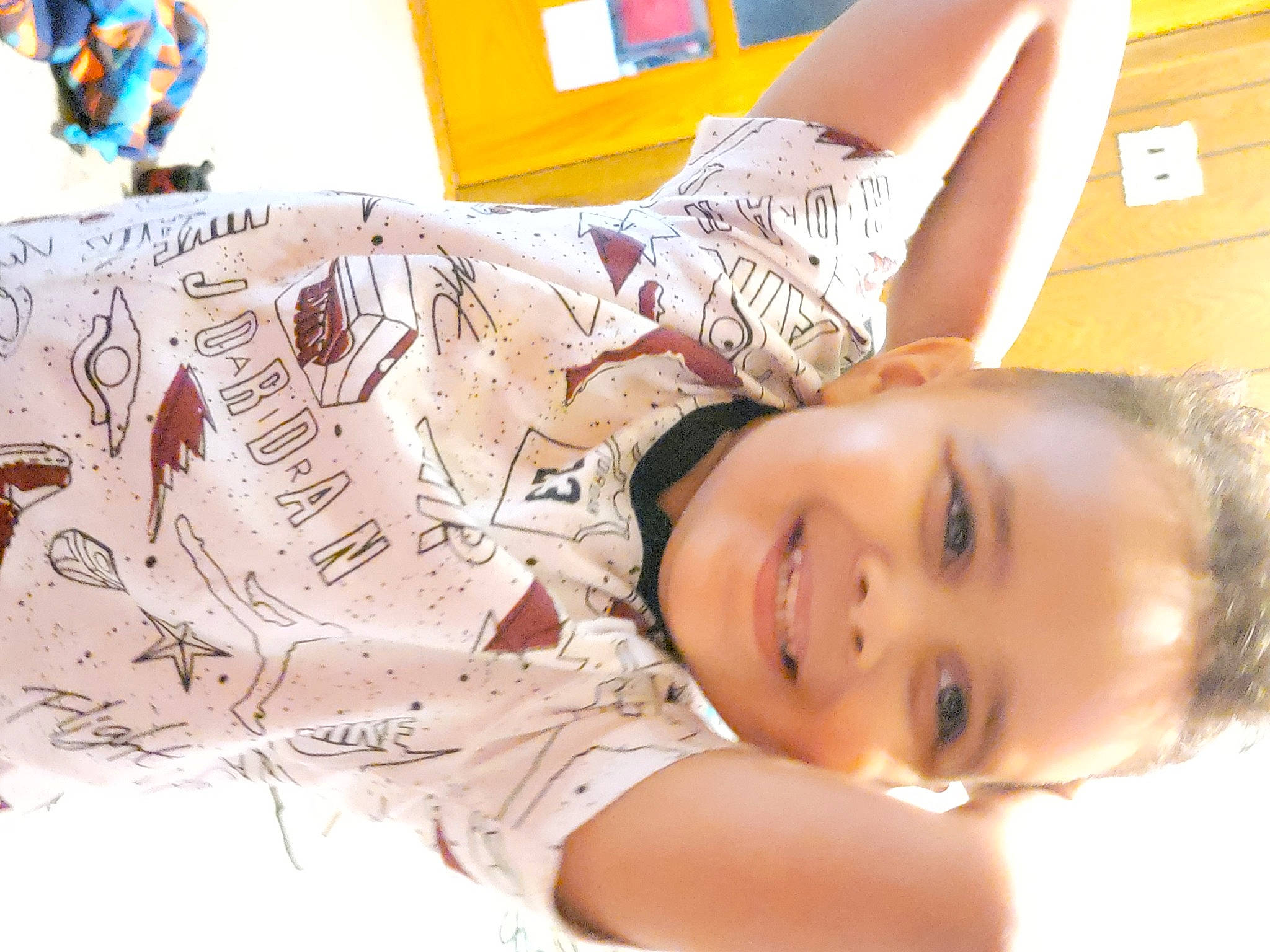 Jamari is registered to the contest to win money with this photo: abdomen, chest, child, comfort, elbow, eyelash, fashion_design, finger, flooring, fun, happy, human_leg, joy, leisure, linens, neck, pattern, person, skin, smile