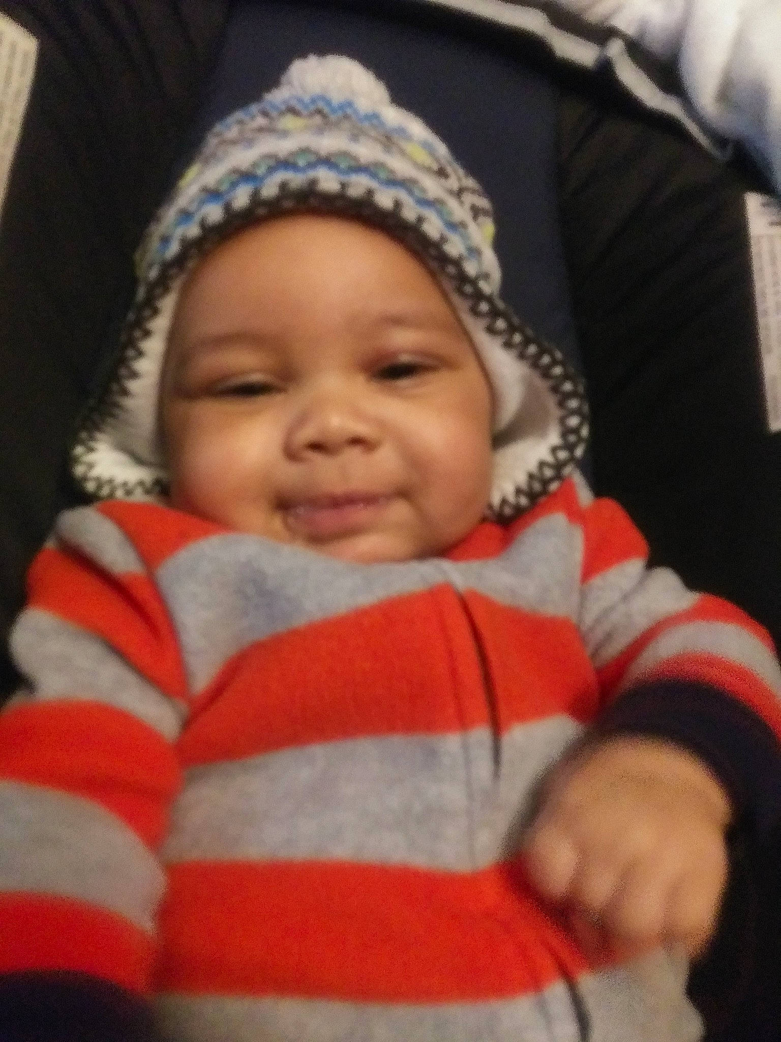 Jamari joined the competition — help win amazing prizes! baby, bonnet, cheek, child, face, head, headgear, knit_cap, knitting, person, skin, smile, toddler, wool