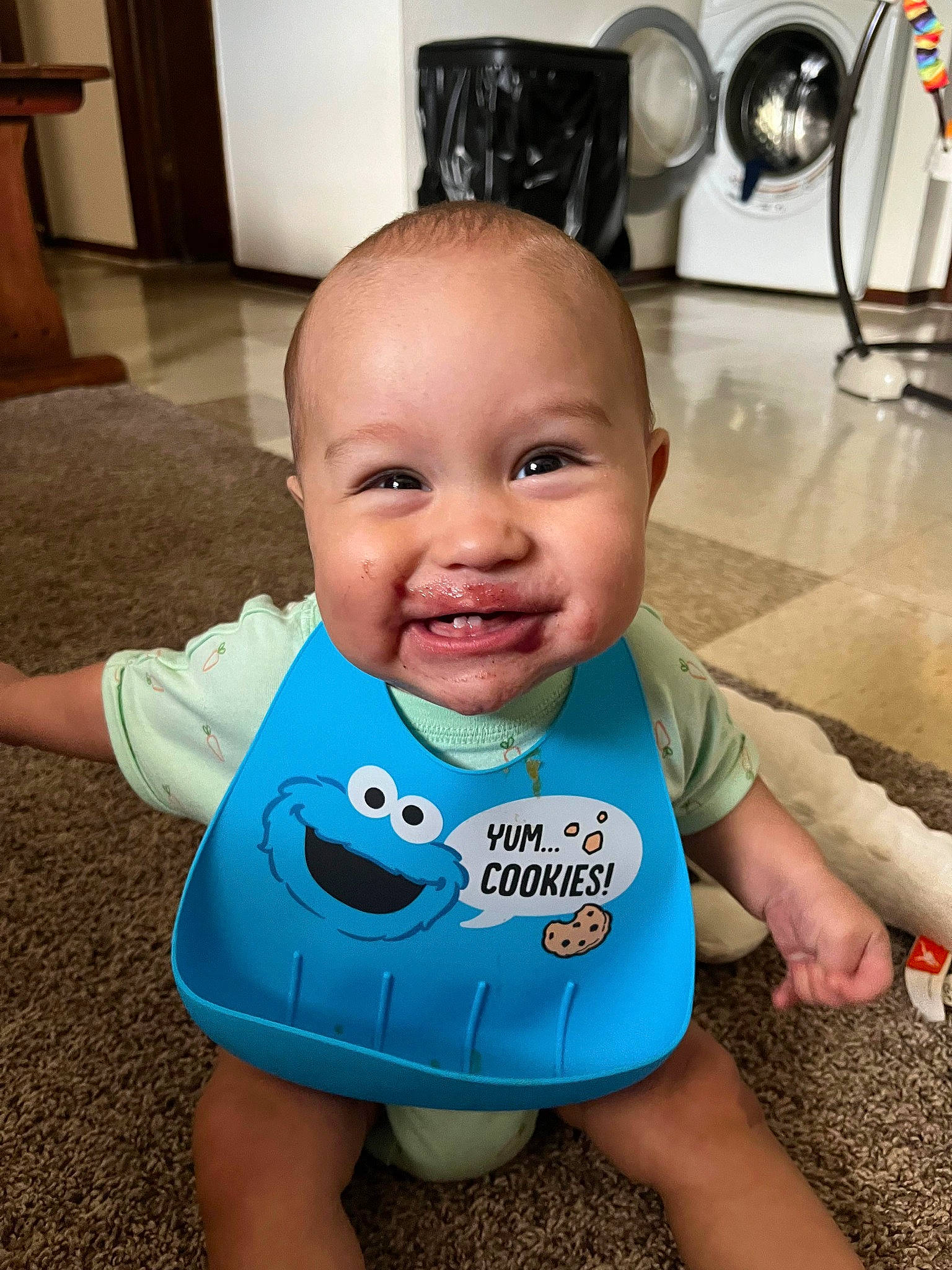 Andrius joined the competition — help win amazing prizes! baby, baby_toddler_clothing, cheek, child, electric_blue, electronic_device, eye, face, flooring, fun, happy, head, iris, joy, mouth, person, sitting, skin, sleeve, smile