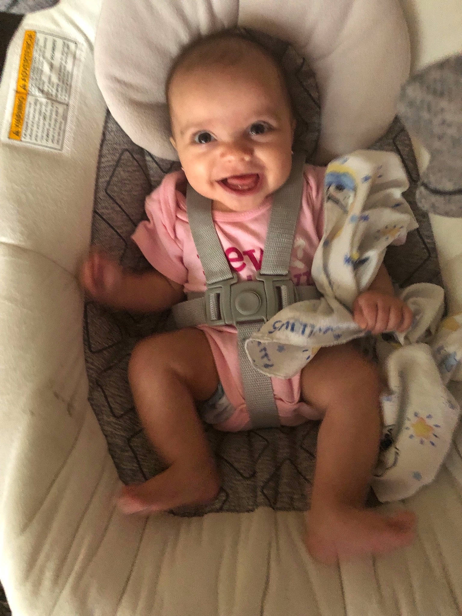 Everleigh Grace is registered to the contest to win money with this photo: baby, baby_in_car_seat, birth, child, comfort, leg, person, sitting, smile, toddler