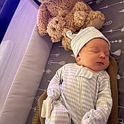 Colter joined the competition — help win amazing prizes! baby, newborn, sleeping, pajamas, hat, blanket, teddy_bear, stuffed_animal, crib, soft_toys, infant, rest, cozy, child, cute, portrait, indoors, peaceful, baby_sleepwear, nursery