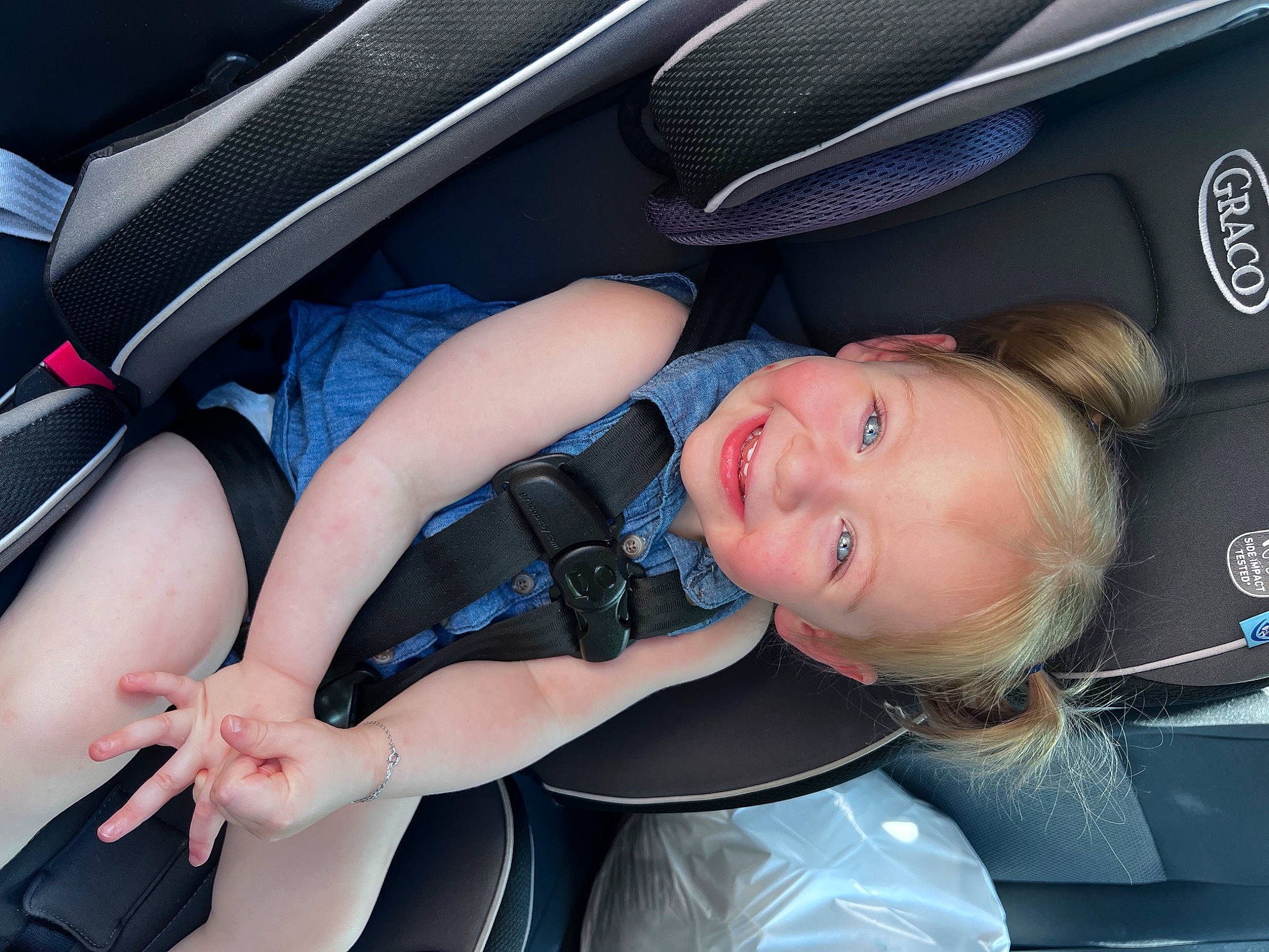Kinslee is registered to the contest to win money with this photo: auto_part, automotive_design, automotive_exterior, automotive_wheel_system, car, car_seat, car_seat_cover, child, comfort, electric_blue, family_car, fun, head_restraint, joy, luxury_vehicle, motor_vehicle, person, personal_luxury_car, smile, thigh