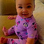 Aurorah is registered to the contest to win money with this photo: baby, child, chubby_cheeks, comfortable, couch, curly_hair, cute, foot, furniture, hand, happy, indoors, infant, minnie_mouse, plush, portrait, purple_clothing, sitting, smiling, young_child