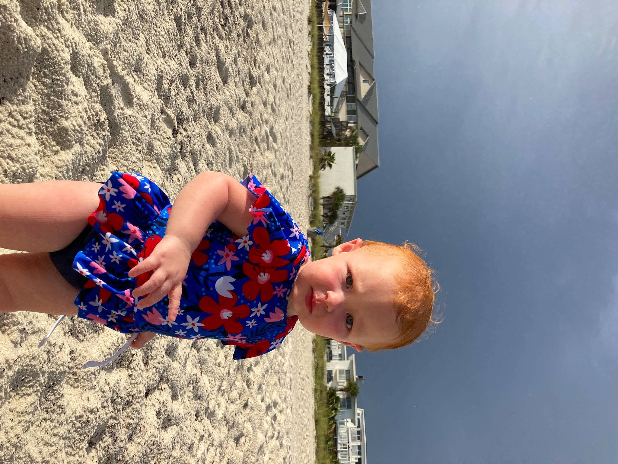 Rylah is registered to the contest to win money with this photo: azure, beach, child, dress, elbow, electric_blue, fun, happy, human_leg, landscape, leisure, people_in_nature, people_on_beach, person, recreation, sky, toddler, tourism, travel, wall