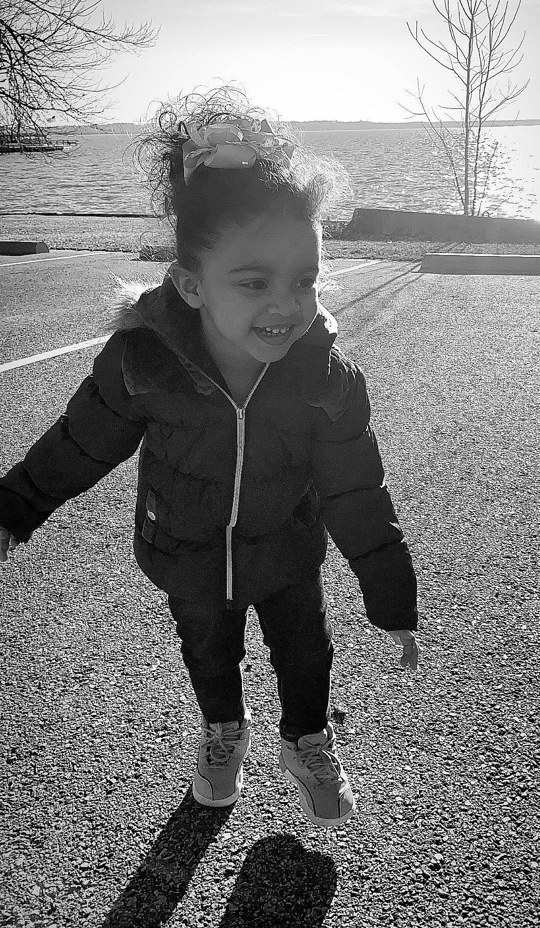 Rhy joined the competition — help win amazing prizes! baby, baby_toddler_clothing, black, black_and_white, child, flash_photography, fun, gesture, grass, happy, joy, monochrome, monochrome_photography, people_in_nature, person, smile, snapshot, standing, style, tints_and_shades