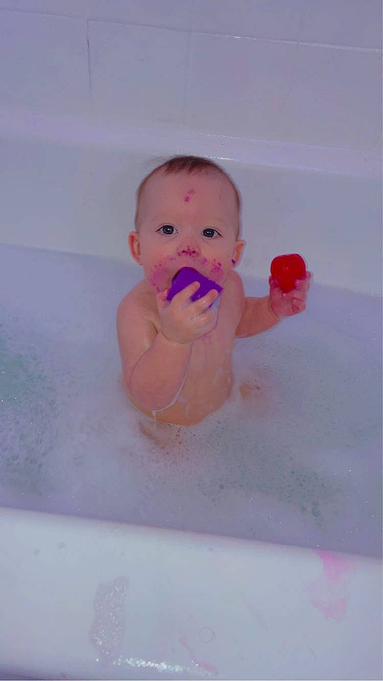Zariah joined the competition — help win amazing prizes! baby, baby_bathing, bath_toy, bathing, bathroom, bathtub, cheek, chest, eyebrow, fluid, foam, fun, jaw, lip, liquid, nose, person, pink, skin, toddler