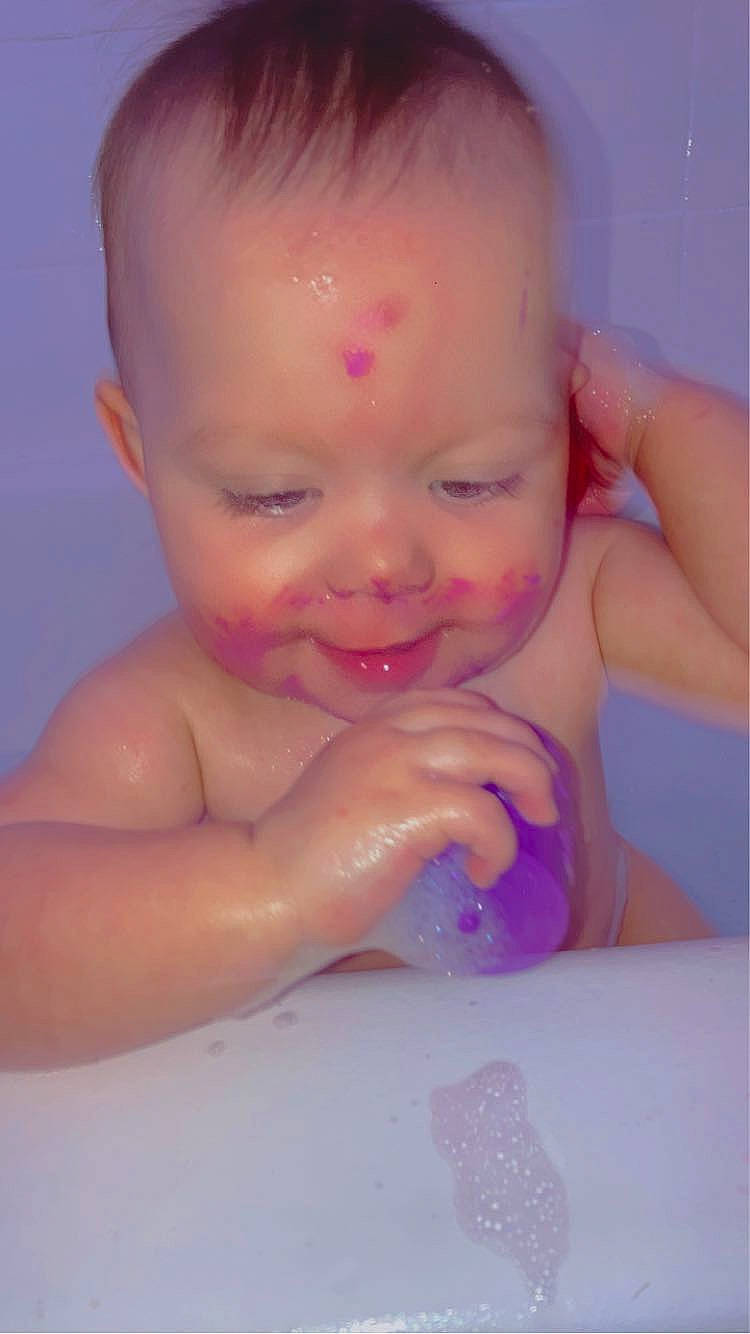 Zariah is registered to the contest to win money with this photo: arm, baby_bathing, bathroom, cheek, ear, eyebrow, facial_expression, fluid, happy, head, human_body, iris, lip, mouth, muscle, nose, organ, person, skin, smile