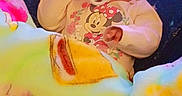 Nova joined the competition — help win amazing prizes! baby, blanket, pacifier, onesie, minnie_mouse, child, infant, cushion, seat, colorful, indoor, cozy, soft, sleepy, cute, child_clothing, pattern, toy, comfort, resting