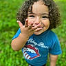 Keshaun joined the competition — help win amazing prizes! blue_shirt, casual_clothing, child, curly_hair, cute, daylight, fun, grass, green_background, hand, happy, nature, outdoor, person, playful, portrait, rolling_stones, smiling, toddler, young_child