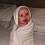 Kaven joined the competition — help win amazing prizes! baby, towel, bed, pillow, headboard, smiling, child, wrapped, indoor, blanket, happy, cute, infant, face, mouth_open, eyes, person, soft, cozy, rest