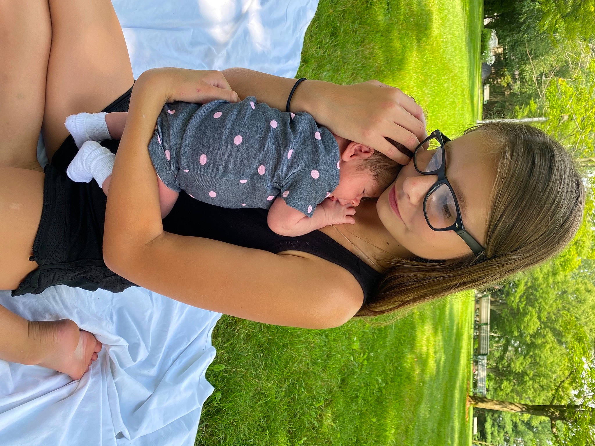 Kaia joined the competition — help win amazing prizes! arm, black_hair, finger, gesture, glasses, grass, green, happy, human_body, joint, knee, leisure, people_in_nature, person, plant, shoulder, smile, summer, thigh, tree