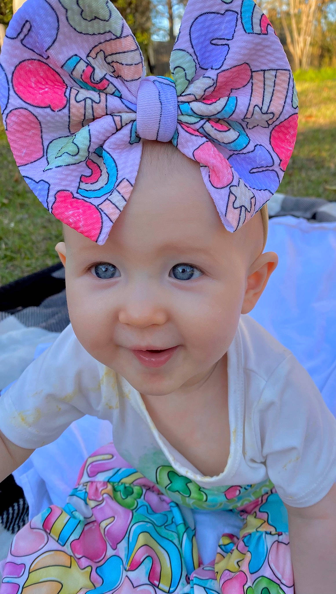 Haven is registered to the contest to win money with this photo: baby_toddler_clothing, blue, cap, child, clothing, cool, eye, grass, happy, headgear, headwear, joy, magenta, people, person, pink, plant, purple, sleeve, smile