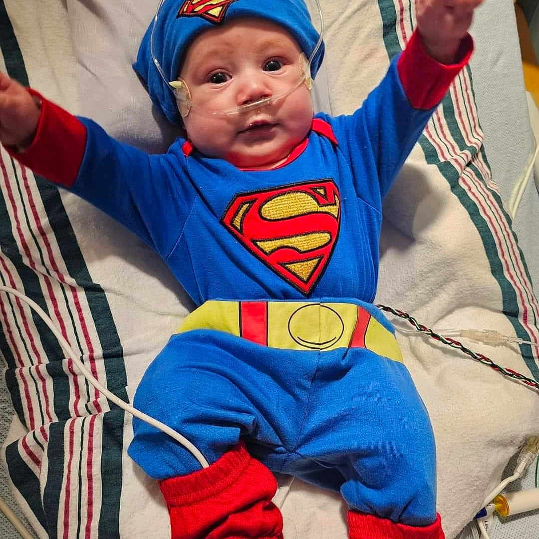 Rowen joined the competition — help win amazing prizes! architecture, baby, bed, blanket, bodypart, building, clothing, costume, face, finger, furniture, hand, happy, head, homedecor, hospital, person, photography, portrait, smile