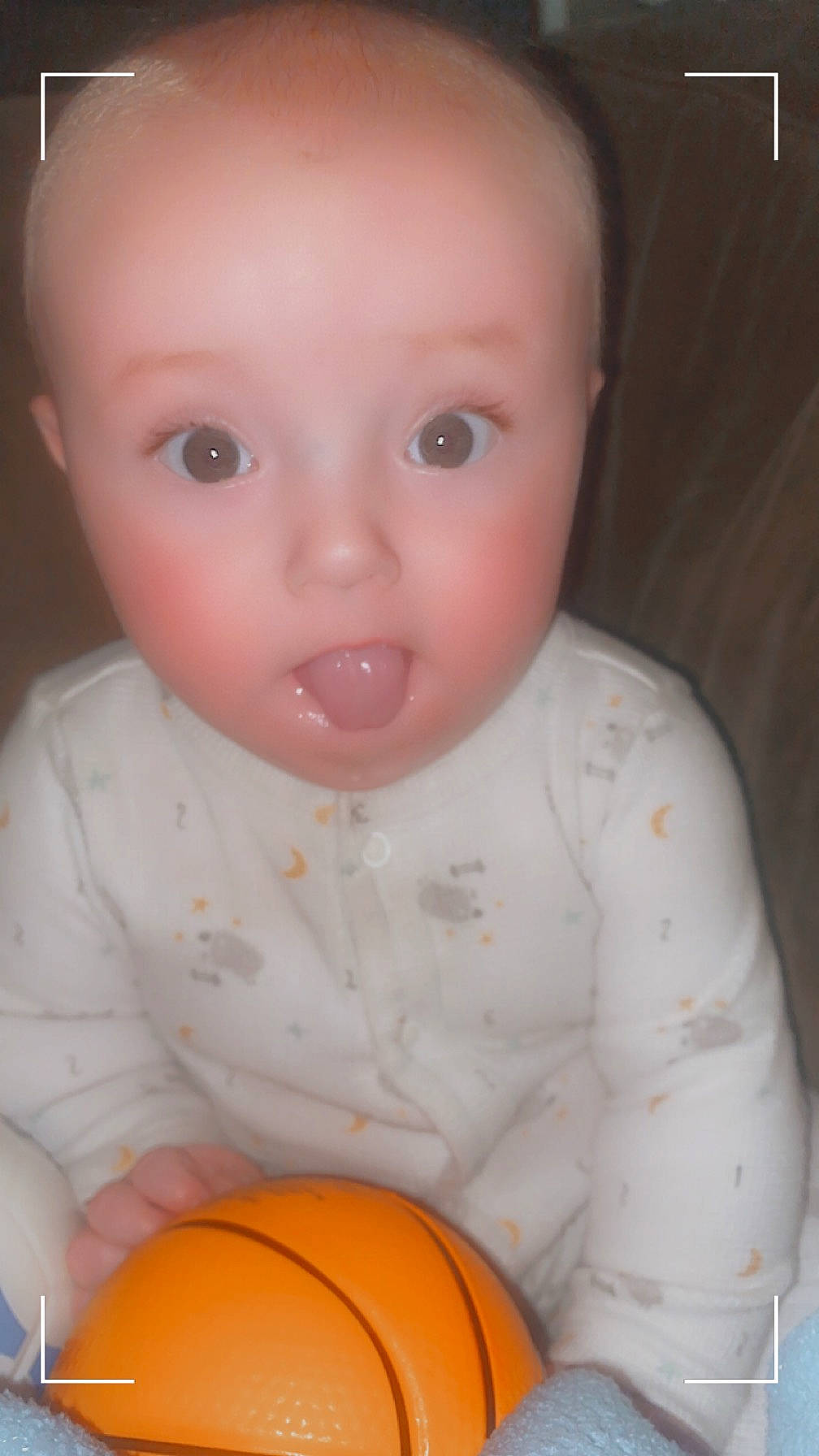 Kayden is registered to the contest to win money with this photo: baby, baby_toddler_clothing, ball, calabaza, cheek, child, chin, eye, eyelash, facial_expression, gourd, iris, lip, mouth, nose, person, pumpkin, skin, surprise, toddler