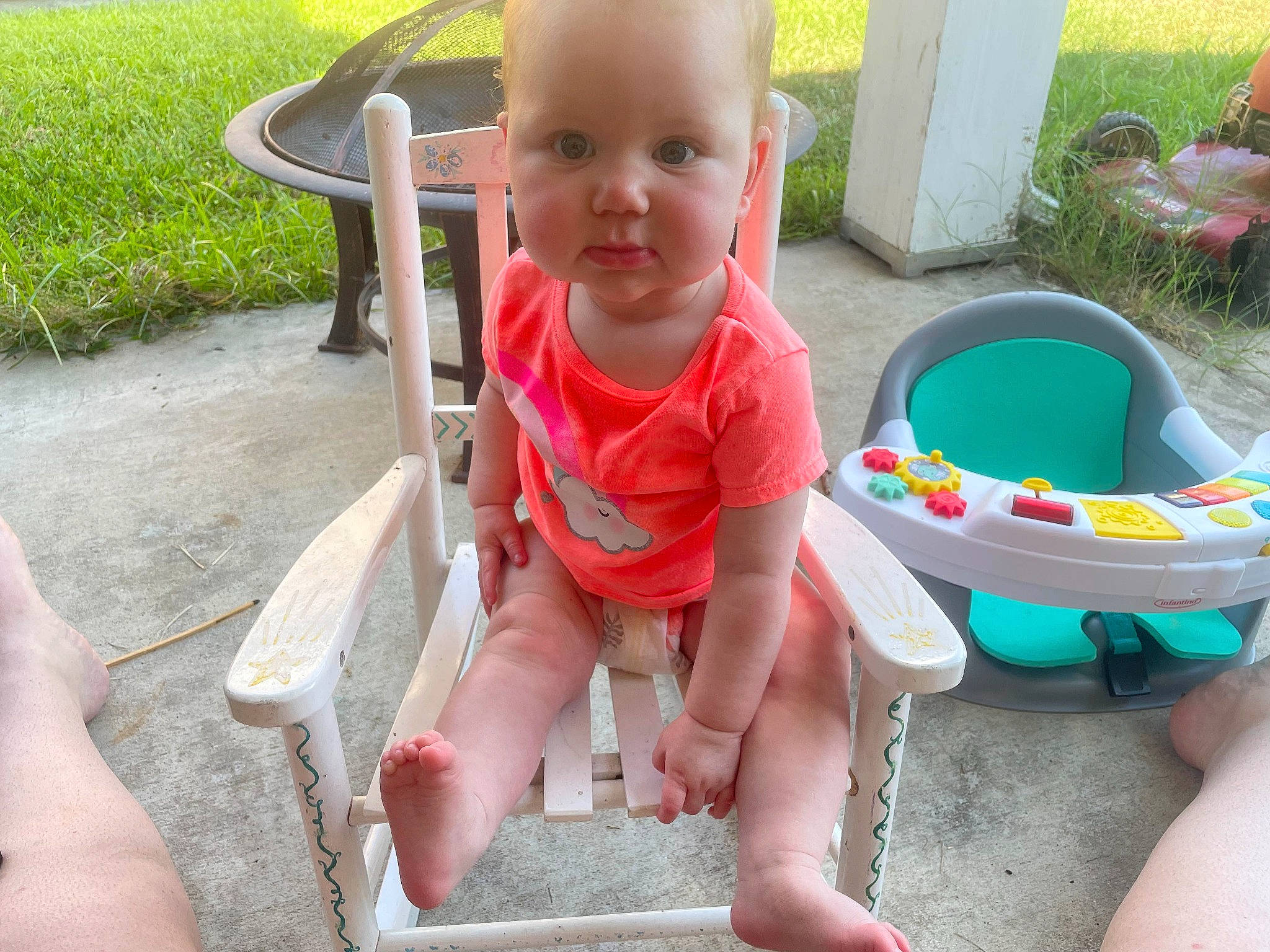 Skylar joined the competition — help win amazing prizes! baby, baby_products, baby_toddler_clothing, chair, child, foot, fun, grass, green, happy, human_leg, leisure, person, plant, play, recreation, sitting, smile, thigh, thumb
