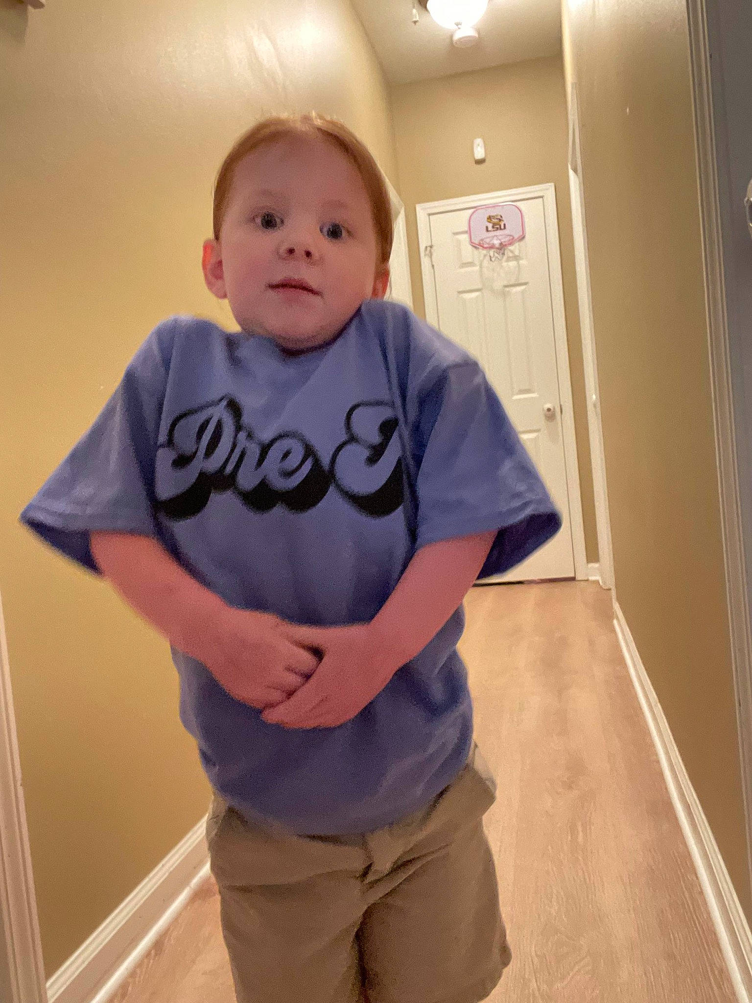 Charlotte is registered to the contest to win money with this photo: baby, baby_toddler_clothing, cheek, chin, elbow, electric_blue, eyebrow, eyewear, flooring, fun, hairstyle, long_sleeved_t_shirt, mouth, neck, nose, person, room, sleeve, t_shirt, toddler