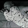 Leland is registered to the contest to win money with this photo: baby, sleeping, onesie, infant, cozy, soft, peaceful, pattern, clothing, indoors, rest, cute, child, young, toddler, sleep, face, skin, hand, quiet