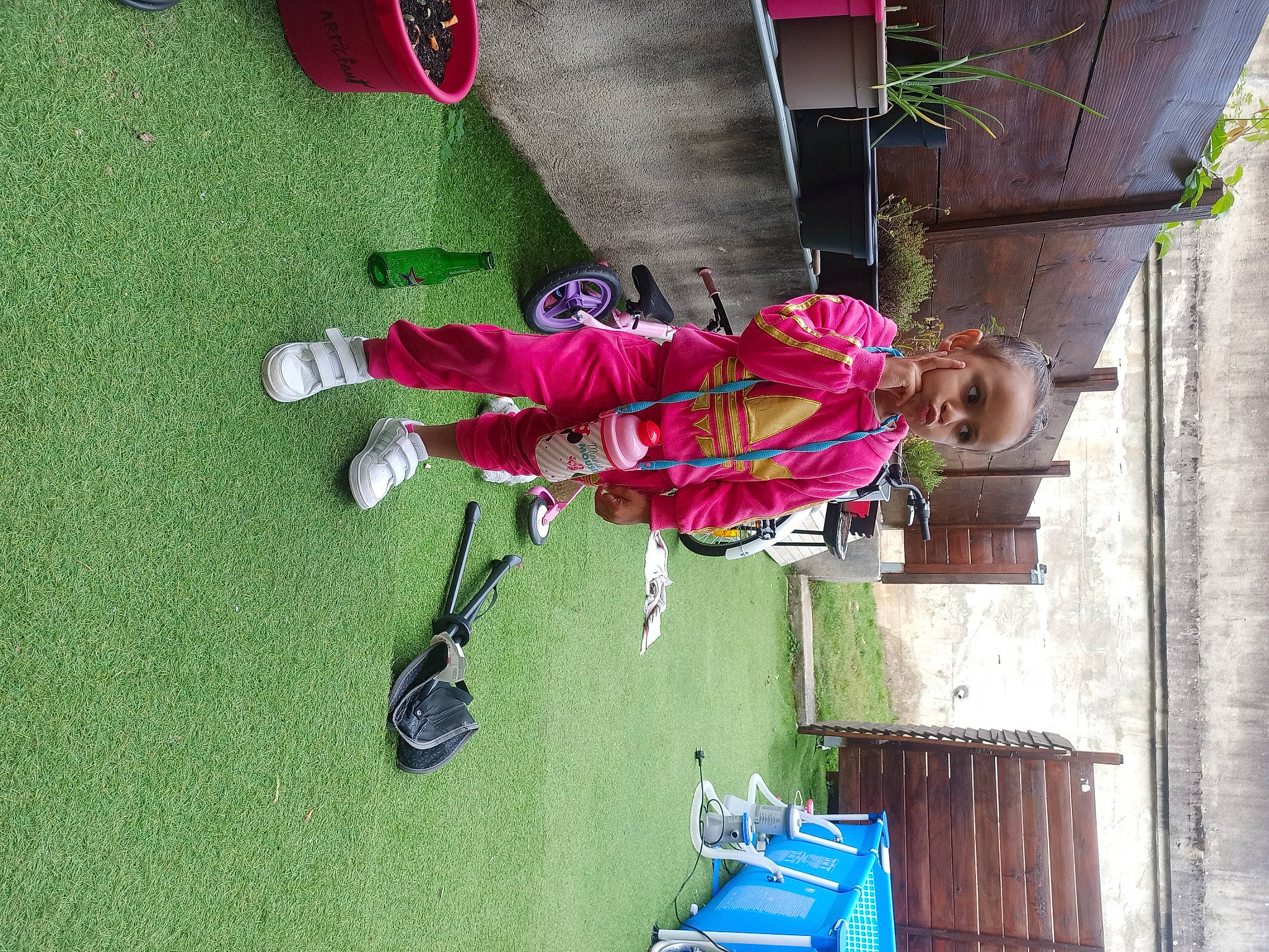 Louéna participe au concours pour gagner de l'argent avec cette photo : boot, carmine, child, fun, grass, green, leisure, magenta, outdoor_shoe, person, plant, recreation, shoe, smile, sneakers, toddler, tree, walking_shoe