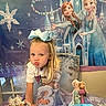 anna, birthday, bow, cake_topper, cartoon_characters, celebration, child, decorations, elsa, festive, frozen, girl, happy, indoor, number_three, party, pose, pouting, table, tutu
