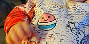 Luna'Rae joined the competition — help win amazing prizes! baby, cartoon, child, clothing, colorful, cozy, cute, face, hand, happy, heart, indoors, infant, lying_down, person, playful, smiling, soft_surface, star, unicorn
