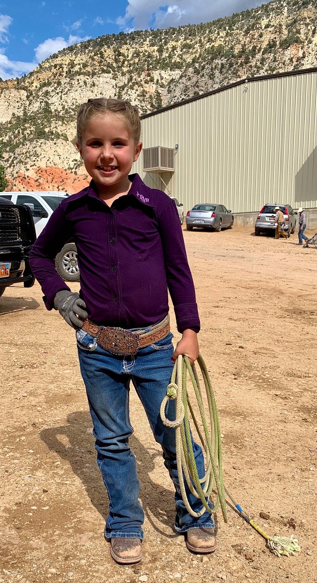 Talya is registered to the contest to win money with this photo: automotive_tire, automotive_wheel_system, bicycle_tire, car, denim, electric_blue, grass, happy, jeans, joy, landscape, leisure, person, recreation, rock_climbing_equipment, rope, smile, sneakers, t_shirt, tire