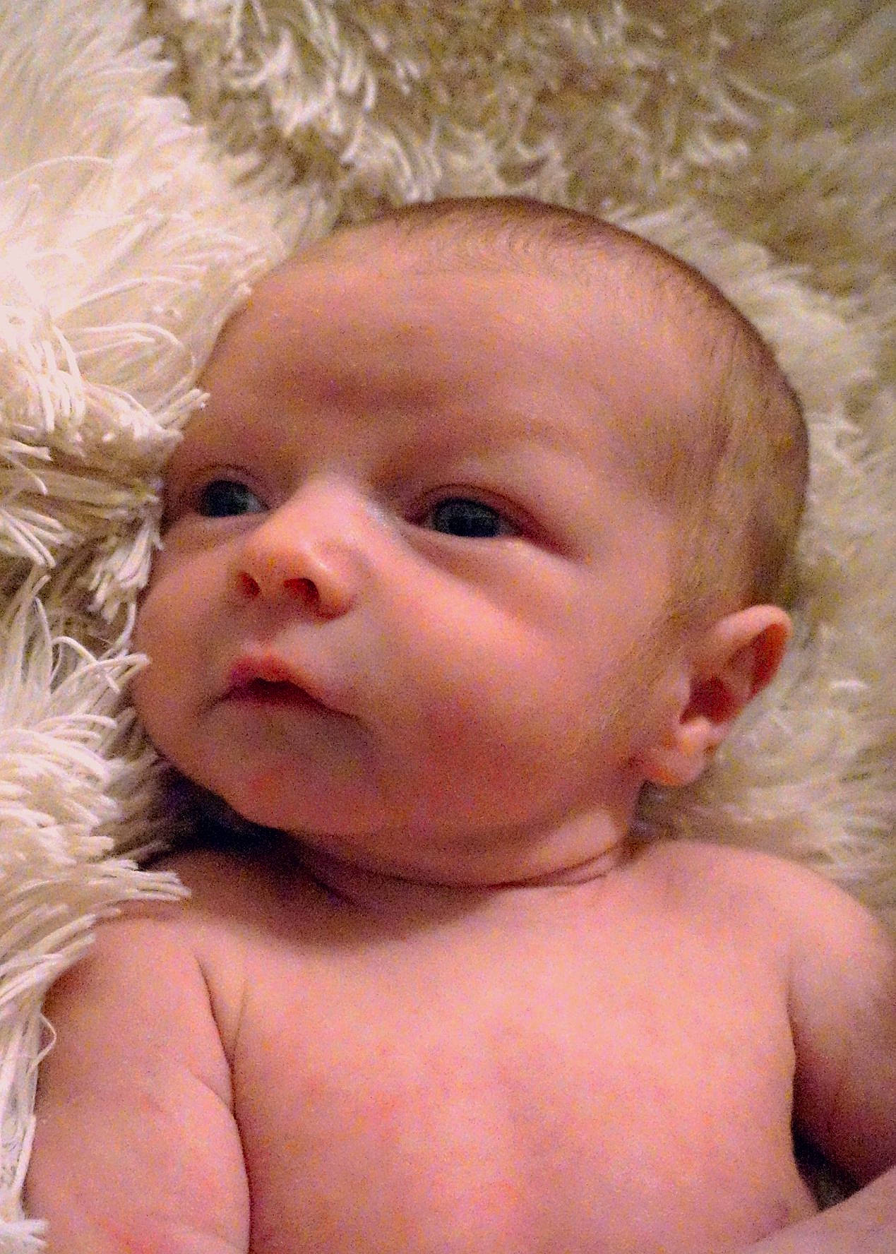 Sullivan joined the competition — help win amazing prizes! cheek, child, chin, close_up, ear, face, finger, forehead, hand, head, human_hair_color, infant, iris, lip, mouth, nose, person, skin, toddler