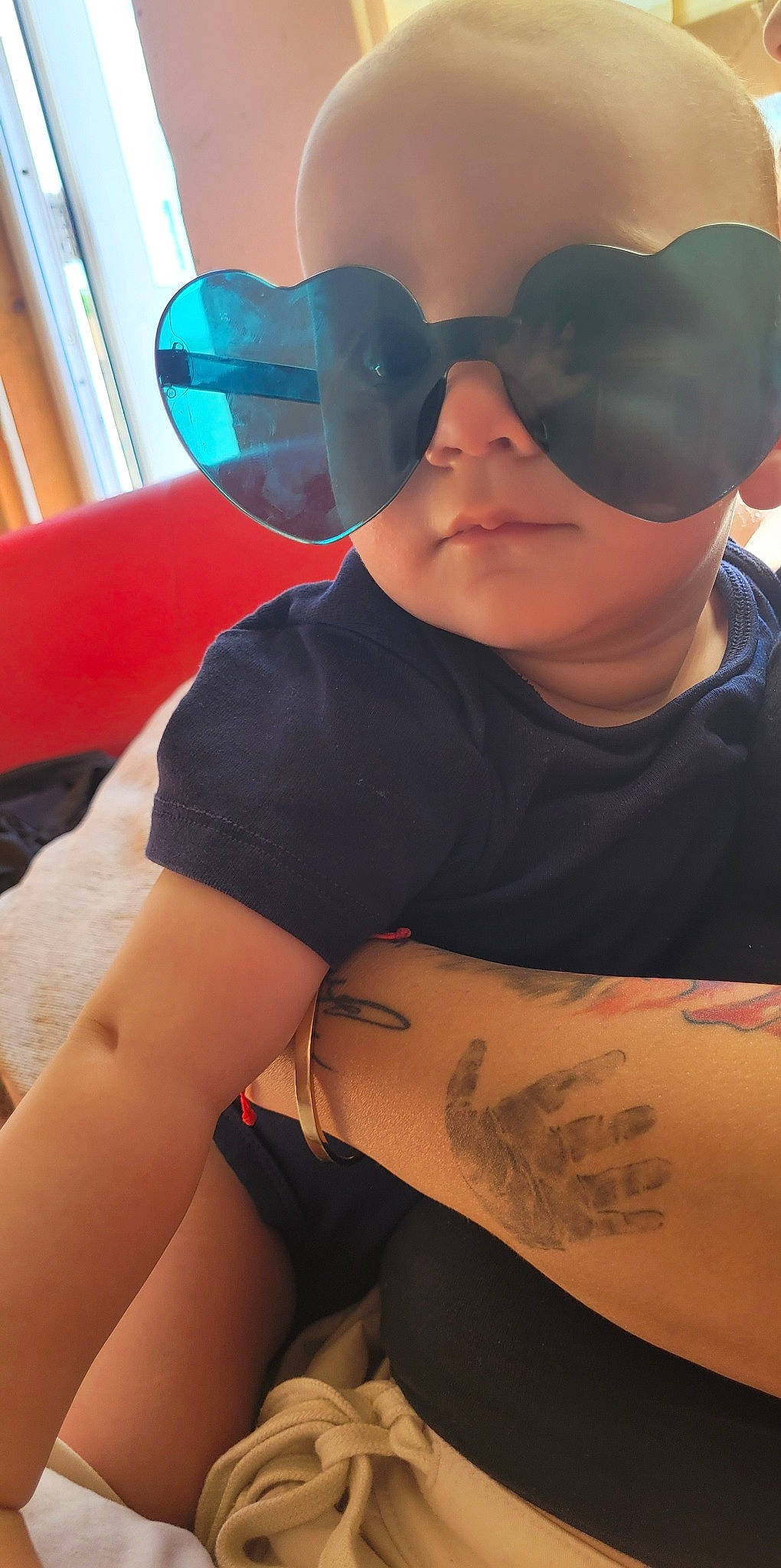 Denis is registered to the contest to win money with this photo: baseball_cap, cap, chest, cool, elbow, electric_blue, eyewear, glasses, goggles, human_leg, knee, mouth, person, personal_protective_equipment, sleeve, sunglasses, t_shirt, tattoo, thigh, trunk