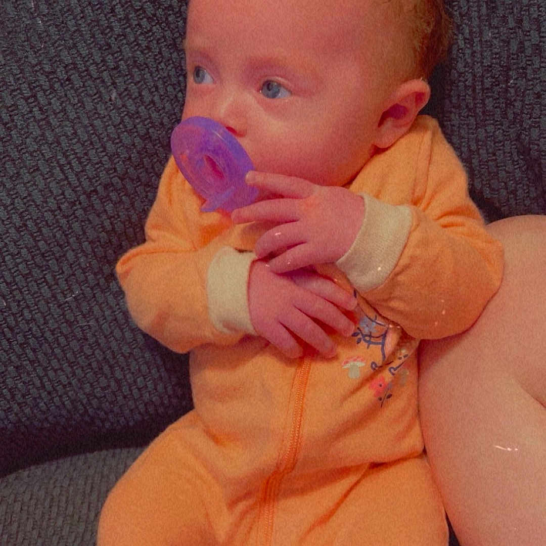 Athena joined the competition — help win amazing prizes! accessories, baby, bodypart, chair, clothing, couch, cushion, face, finger, furniture, hand, head, homedecor, newborn, pants, person, photography, portrait, sitting, sleeping