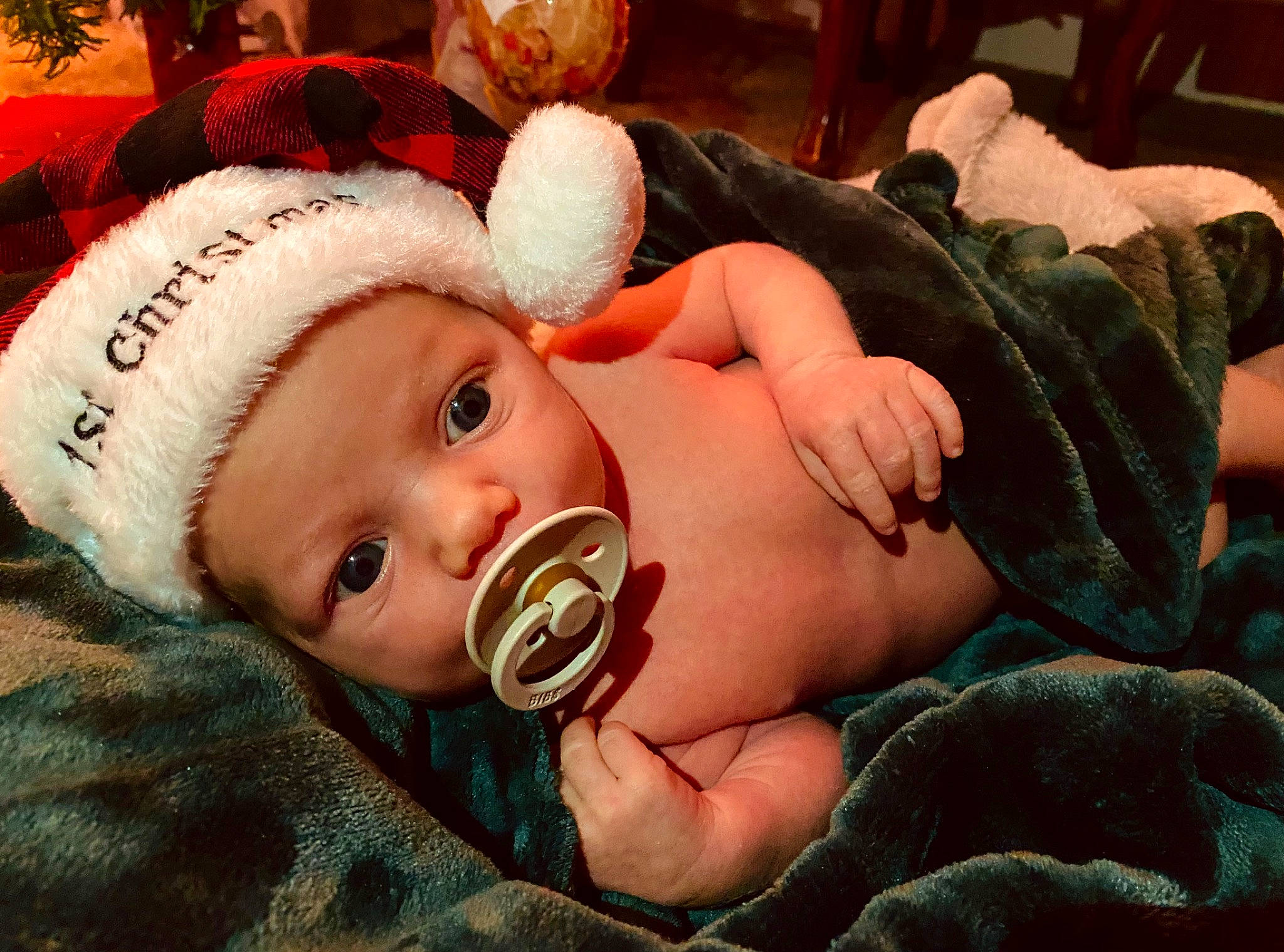 Izaiah is registered to the contest to win money with this photo: baby, baby_toddler_clothing, cheek, child, comfort, ear, event, eye, fun, fur, grass, happy, hat, head, headwear, holiday, linens, mouth, nose, person