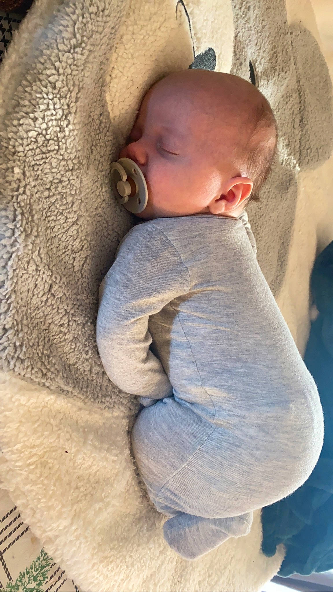 Izaiah joined the competition — help win amazing prizes! baby, baby_products, baby_sleeping, baby_toddler_clothing, cheek, child, comfort, electric_blue, eye, face, fur, gesture, head, iris, linens, nose, person, sitting, skin, sleeve