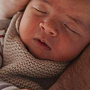 Zwak is registered to the contest to win money with this photo: newborn, baby, sleeping, hand, adult_hand, knitted_blanket, cozy, close_up, portrait, skin, face, peaceful, resting, infant, cuddle, soft_lighting, family, love, tenderness, warmth