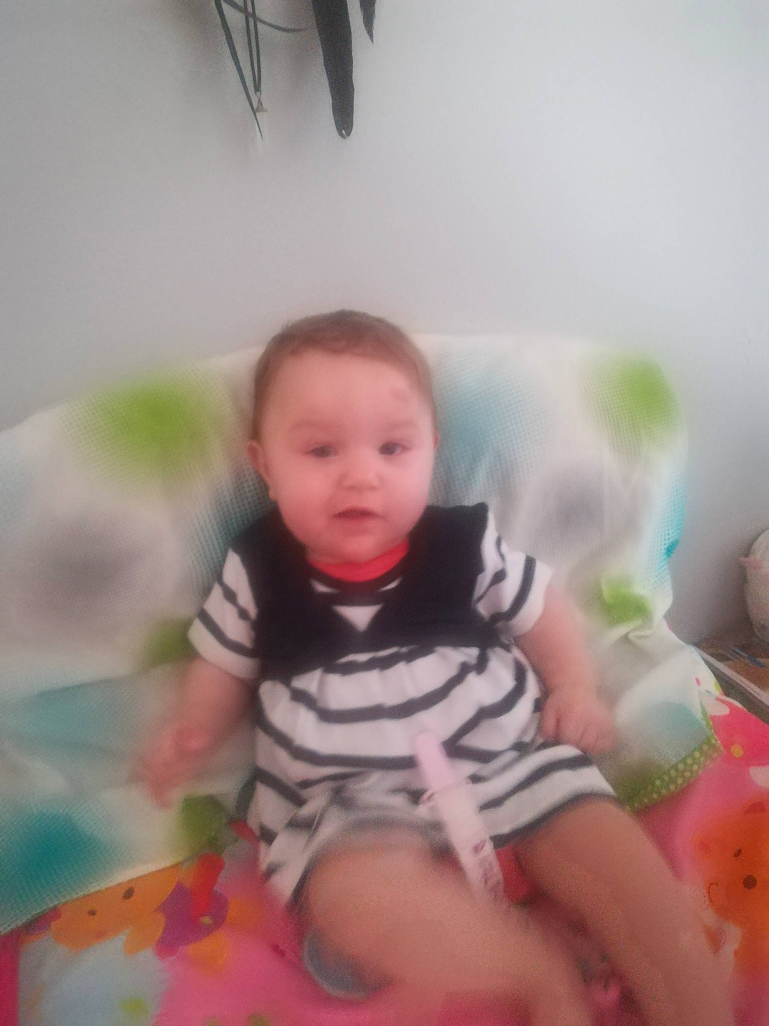 Kassandra participe au concours pour gagner de l'argent avec cette photo : baby, baby_products, baby_toddler_clothing, cheek, child, eye, facial_expression, finger, fun, iris, mouth, person, play, product, sitting, skin, smile, toddler