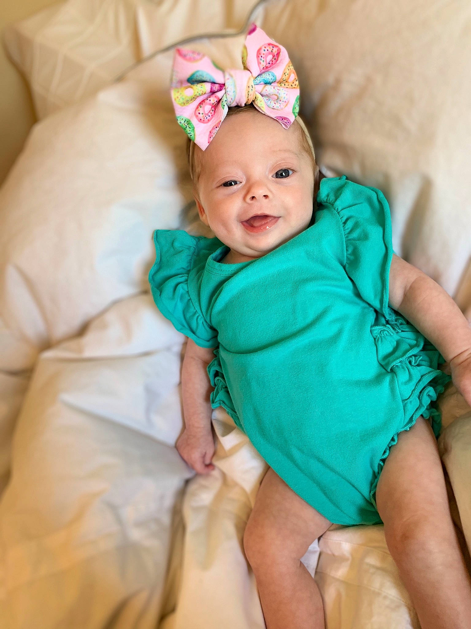 Annaleigh is registered to the contest to win money with this photo: baby, baby_products, baby_toddler_clothing, child, child_model, dress, fashion_accessory, hair_accessory, headband, headgear, headpiece, person, photo_shoot, photography, pink, product, skin, sleeve, toddler, turquoise