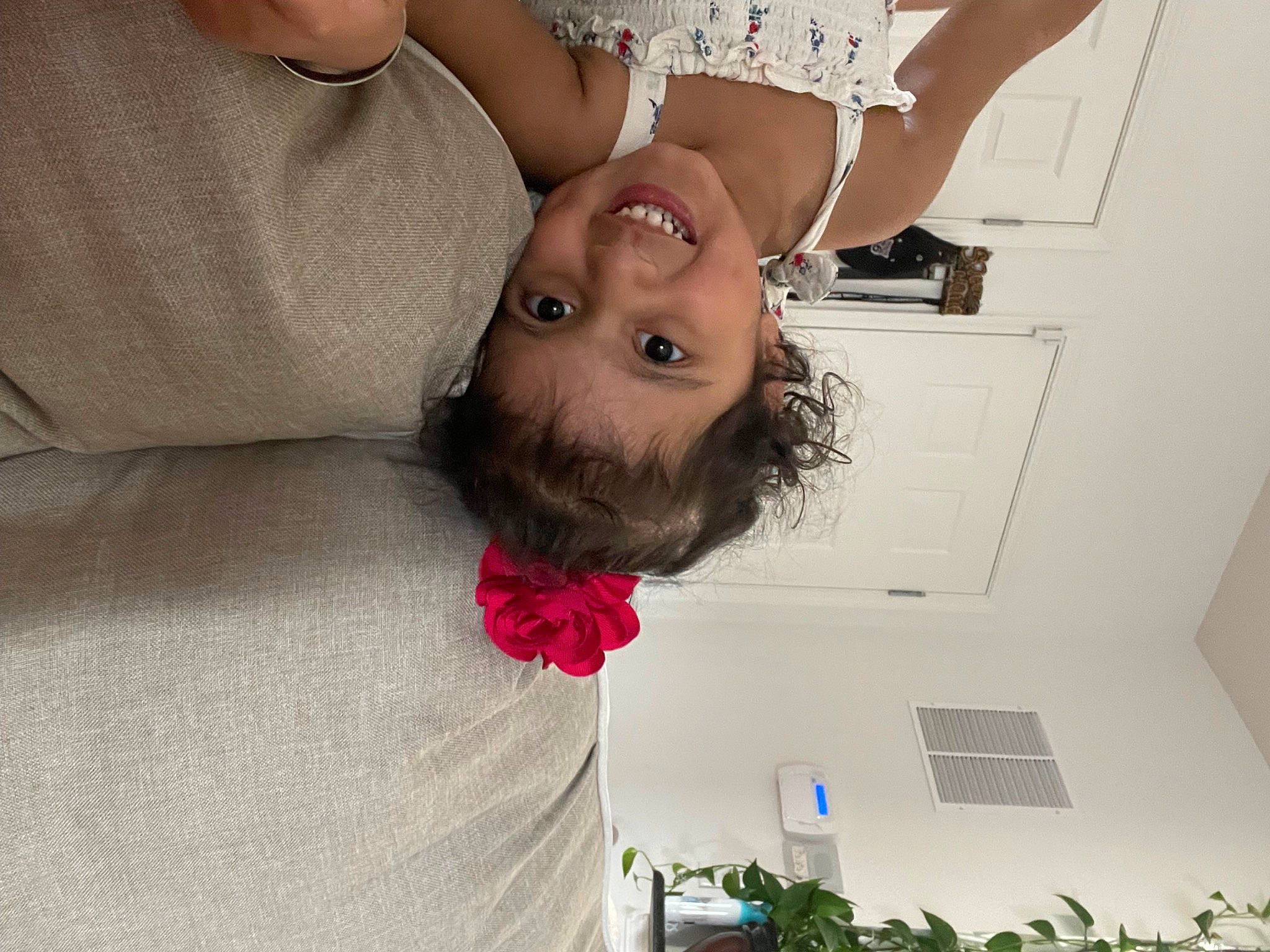 Saanjh is registered to the contest to win money with this photo: abdomen, chest, child, comfort, couch, elbow, eyelash, fun, gesture, happy, human_leg, joy, knee, person, plant, room, smile, thigh