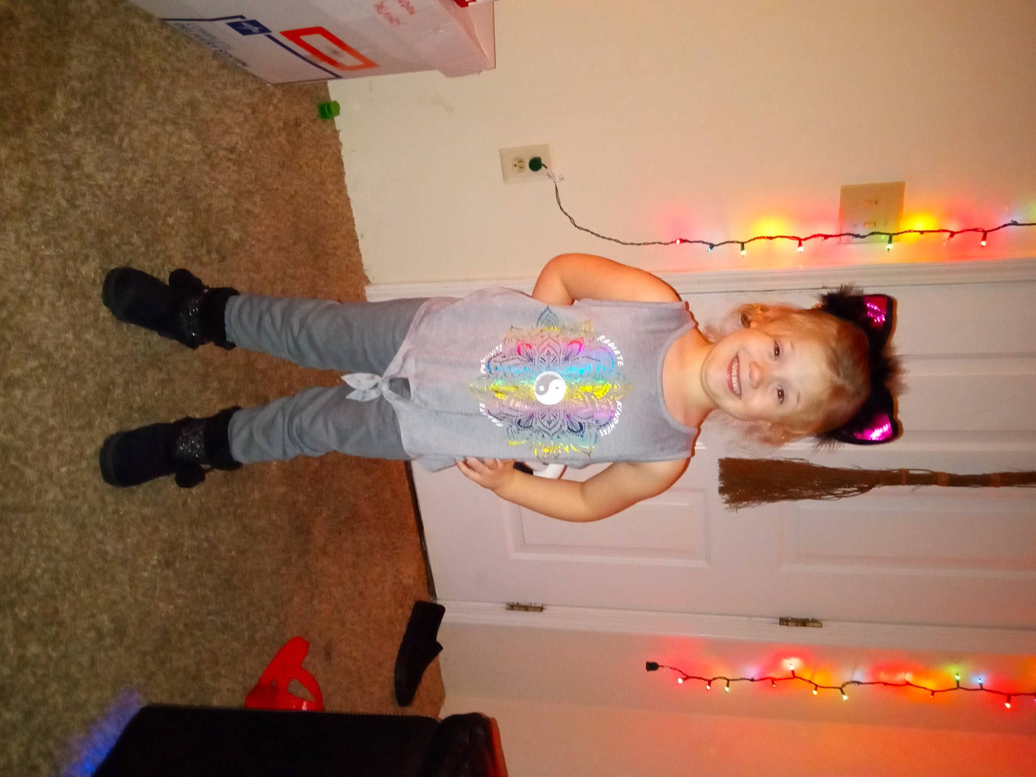 Natalie is registered to the contest to win money with this photo: baby, baby_toddler_clothing, ceiling, child, flooring, fun, happy, joy, person, play, room, toddler, walking_shoe, wood