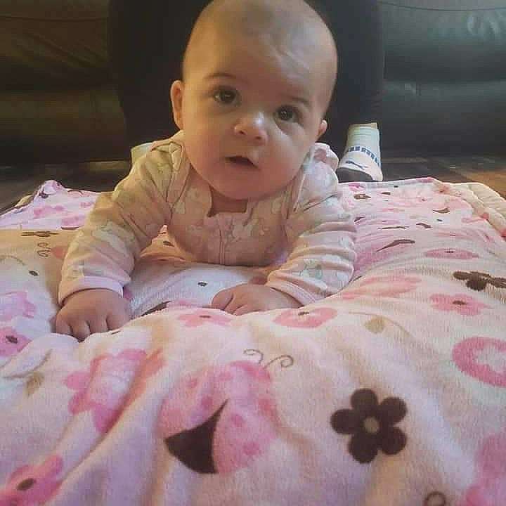 Auriella joined the competition — help win amazing prizes! baby, baby_toddler_clothing, bedding, cheek, child, chin, comfort, finger, flooring, happy, linens, mammal, person, pink, product, skin, sleeve, smile, textile, toddler